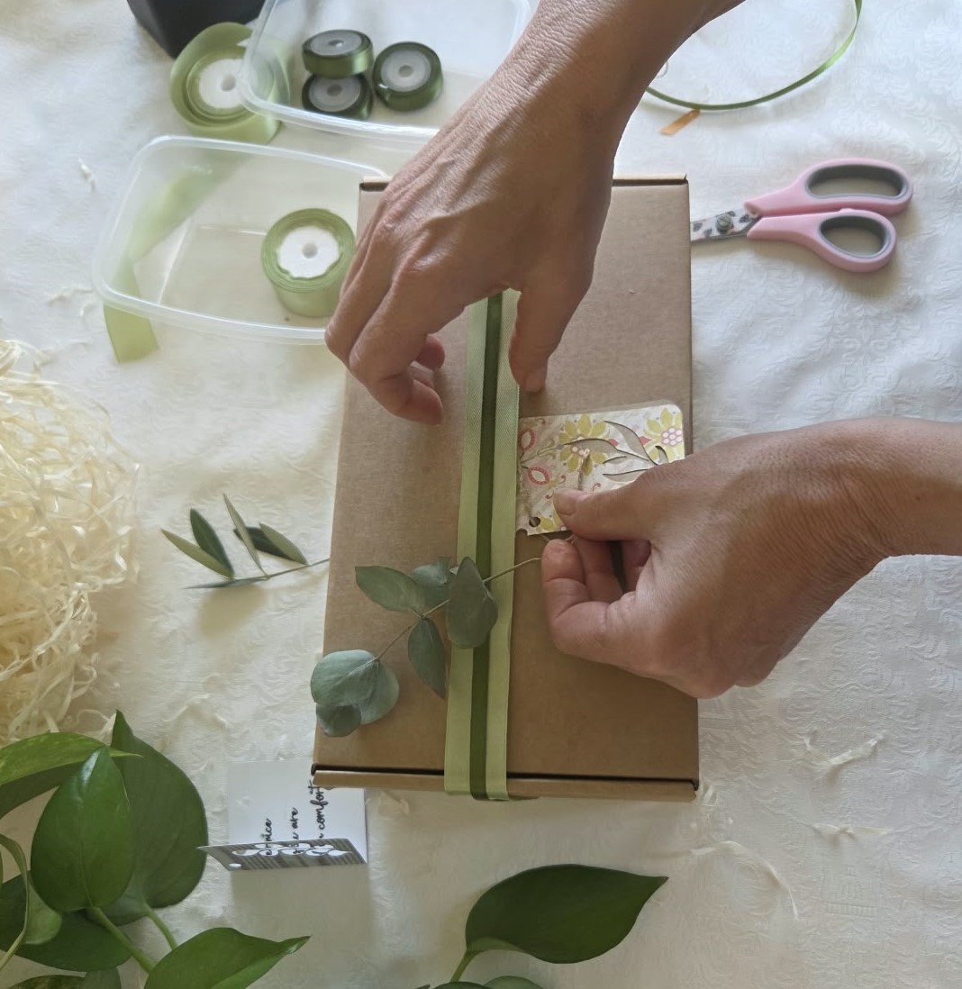 A thoughtful gift being prepared with care and intention